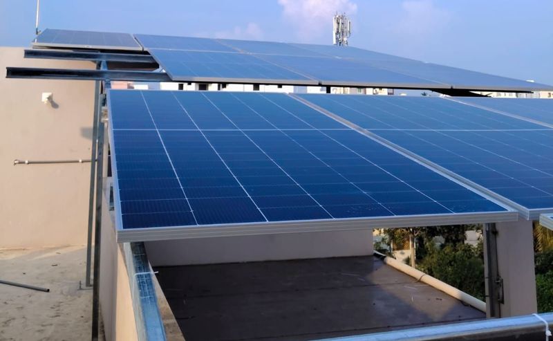 Eliova rooftop solar on raised steel frames over a house terrace